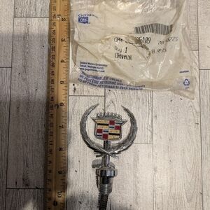 Cadillac Silver and Red Hood Ornament
